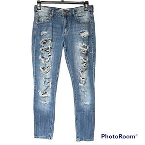 👖GARAGE: Women’s size 09 skinny, medium wash ripped jeans, barely worn.